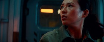 Movie still from “The Cloverfield Paradox” (2018), directed by Julius Onah – A person looking up at the sky; Close Up shot, Low angle