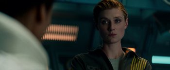 Movie still from “The Cloverfield Paradox” (2018), directed by Julius Onah – A person wearing a jacket; Close Up shot, Over the shoulder angle