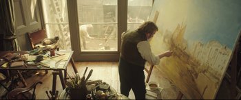 Movie still from “Mr. Turner” (2014), directed by Mike Leigh – A man painting a mural in a room with a large window; Wide shot, Over the shoulder angle