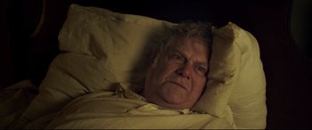 Movie still from “Mr. Turner” (2014), directed by Mike Leigh – An older man laying in a bed with his head on a pillow; Close Up shot, High angle