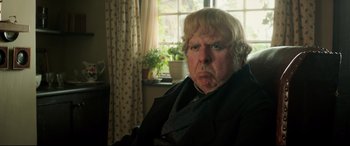 Movie still from “Mr. Turner” (2014), directed by Mike Leigh – An older man with blonde hair and a beard; Close Up shot, Over the shoulder angle