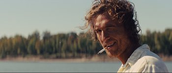Movie still from “Mud” (2012), directed by Jeff Nichols – A person holding a cigarette in his mouth; Close Up shot, Low angle