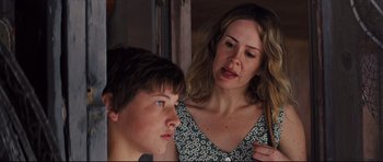 Movie still from “Mud” (2012), directed by Jeff Nichols – A woman and a young boy looking at each other; Close Up shot, Over the shoulder angle