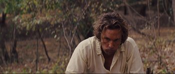 Movie still from “Mud” (2012), directed by Jeff Nichols – A person with long hair; Close Up shot, Over the shoulder angle