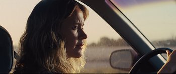 Movie still from “Mud” (2012), directed by Jeff Nichols – A person in a car looking out the window; Close Up shot, Low angle