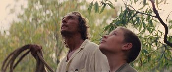 Movie still from “Mud” (2012), directed by Jeff Nichols – A man and a woman looking up at the sky; Close Up shot, Low angle