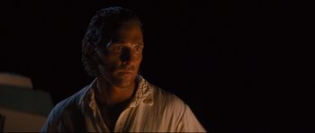 Movie still from “Mud” (2012), directed by Jeff Nichols – A person wearing a white shirt; Close Up shot, Over the shoulder angle