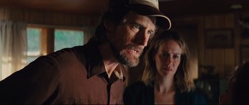 Movie still from “Mud” (2012), directed by Jeff Nichols – A man and a woman standing next to each other in a room; Close Up shot, Over the shoulder angle