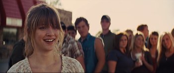 Movie still from “Mud” (2012), directed by Jeff Nichols – A group of young men and a woman standing together; Close Up shot, Over the shoulder angle