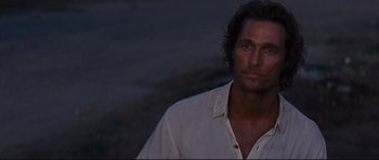 Movie still from “Mud” (2012), directed by Jeff Nichols – A person wearing a white shirt; Close Up shot, Over the shoulder angle