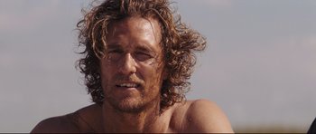 Movie still from “Mud” (2012), directed by Jeff Nichols – A person with long hair; Close Up shot, Low angle