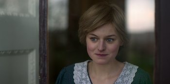 Movie still from “The Crown” (2016), created by Peter Morgan – A person with short brown hair; Close Up shot, Over the shoulder angle