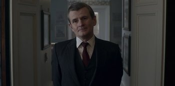 Movie still from “The Crown” (2016), created by Peter Morgan – Close Up shot, Low angle