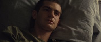 Movie still from “Never Let Me Go” (2010), directed by Mark Romanek – A person laying in a bed; Close Up shot, Overhead angle