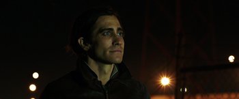 Movie still from “Nightcrawler” (2014), directed by Dan Gilroy – A person wearing a jacket; Close Up shot, Low angle