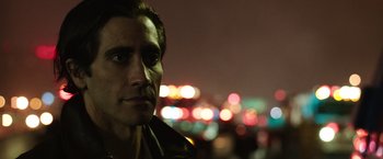 Movie still from “Nightcrawler” (2014), directed by Dan Gilroy – A person wearing a leather jacket; Close Up shot, Low angle