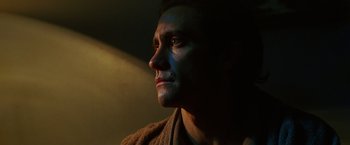 Movie still from “Nightcrawler” (2014), directed by Dan Gilroy – A person looking to his left; Close Up shot, Low angle