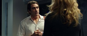 Movie still from “Nightcrawler” (2014), directed by Dan Gilroy – A man and a woman talking to one another; Close Up shot, Over the shoulder angle