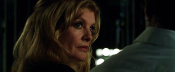 Movie still from “Nightcrawler” (2014), directed by Dan Gilroy – A person with long blonde hair; Close Up shot, Over the shoulder angle