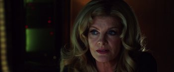 Movie still from “Nightcrawler” (2014), directed by Dan Gilroy – A person with long blonde hair; Close Up shot, Low angle