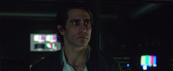 Movie still from “Nightcrawler” (2014), directed by Dan Gilroy – A person wearing a jacket; Close Up shot, Low angle