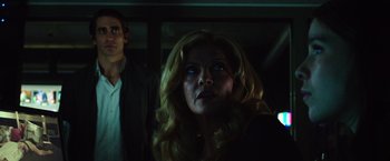 Movie still from “Nightcrawler” (2014), directed by Dan Gilroy – A man and a woman in a dark room; Close Up shot, Low angle
