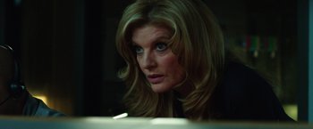 Movie still from “Nightcrawler” (2014), directed by Dan Gilroy – A person with long blonde hair; Close Up shot, Low angle