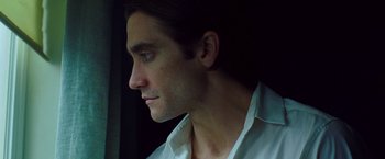 Movie still from “Nightcrawler” (2014), directed by Dan Gilroy – A person wearing a white shirt; Close Up shot, Low angle