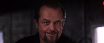 Movie still from “The Departed” (2006), directed by Martin Scorsese – An older man with a beard and a mustache; Close Up shot, Low angle