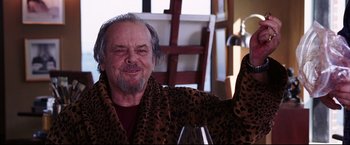 Movie still from “The Departed” (2006), directed by Martin Scorsese – An older man sitting at a table with a glass of wine; Medium shot, Low angle