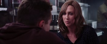 Movie still from “The Departed” (2006), directed by Martin Scorsese – A woman and a young boy looking at each other in front of a mirror; Close Up shot, Over the shoulder angle