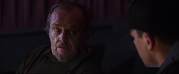 Movie still from “The Departed” (2006), directed by Martin Scorsese – An older man with a beard and a mustache; Close Up shot, Low angle