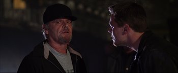 Movie still from “The Departed” (2006), directed by Martin Scorsese – A man and a man talking to each other; Close Up shot, Over the shoulder angle