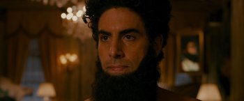 Movie still from “The Dictator” (2012), directed by Larry Charles – Close Up shot, Over the shoulder angle