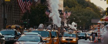 Movie still from “The Dictator” (2012), directed by Larry Charles – A street filled with lots of yellow taxis; Extreme Wide shot, Low angle