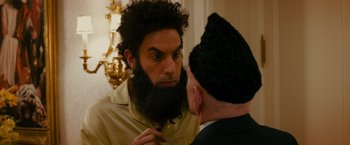 Movie still from “The Dictator” (2012), directed by Larry Charles – Close Up shot, Over the shoulder angle
