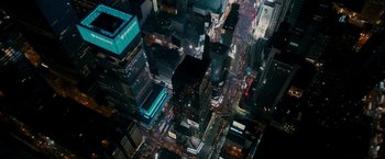 Movie still from “The Dictator” (2012), directed by Larry Charles – An aerial view of a large city at night time; Extreme Wide shot, Overhead angle