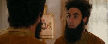 Movie still from “The Dictator” (2012), directed by Larry Charles – Close Up shot, Over the shoulder angle