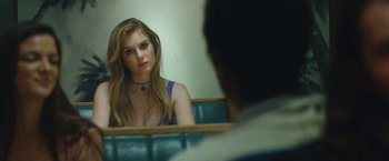Movie still from “The Dirt” (2019), directed by Jeff Tremaine – A beautiful young woman sitting in front of a mirror; Close Up shot, Over the shoulder angle