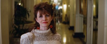 Movie still from “The Dirt” (2019), directed by Jeff Tremaine – A person wearing a sweater; Close Up shot, Over the shoulder angle