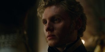 Movie still from “The Empress” (2022), created by Katharina Eyssen – A person wearing a jacket; Close Up shot, Over the shoulder angle