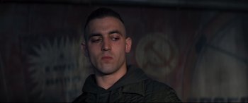 Movie still from “No Time to Die” (2021), directed by Cary Joji Fukunaga – A person with his eyes closed; Close Up shot, Low angle