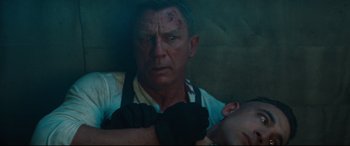 Movie still from “No Time to Die” (2021), directed by Cary Joji Fukunaga – Close Up shot, Overhead angle