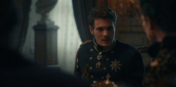 Movie still from “The Empress” (2022), created by Katharina Eyssen – A man in a military uniform is looking at a candle; Close Up shot, Over the shoulder angle