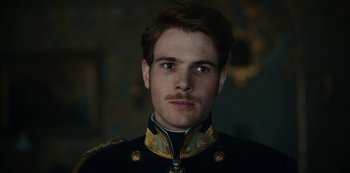 Movie still from “The Empress” (2022), created by Katharina Eyssen – A person wearing a military uniform; Close Up shot, Low angle