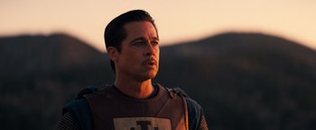 Movie still from “Babylon” (2022), directed by Damien Chazelle – A person wearing a shirt; Close Up shot, Low angle