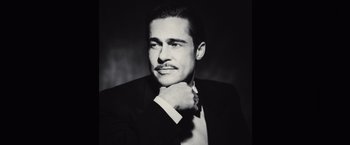 Movie still from “Babylon” (2022), directed by Damien Chazelle – Black and white photograph of a man in a suit and tie; Close Up shot, Low angle