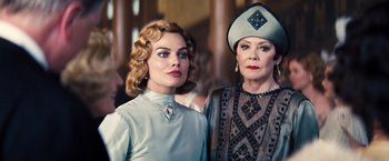 Movie still from “Babylon” (2022), directed by Damien Chazelle – A woman and an older woman standing next to each other; Close Up shot, Low angle