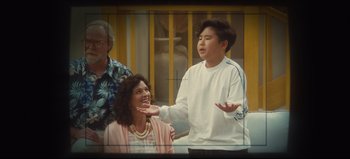 Movie still from “Nope” (2022), directed by Jordan Peele – A young man and a woman in front of an older man and woman; Medium shot, Over the shoulder angle