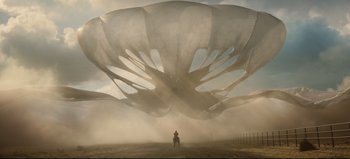 Movie still from “Nope” (2022), directed by Jordan Peele – A man standing in front of a giant balloon; Extreme Wide shot, Low angle